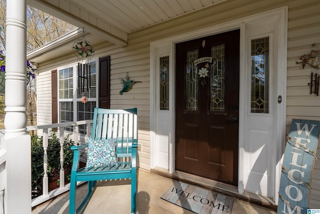 property entrance featuring a porch