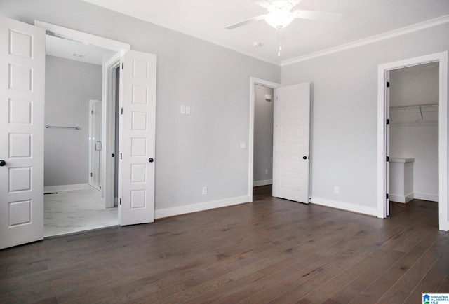 516 Preserve Pkwy, Hoover, AL 35226 - unfurnished bedroom with a closet, a ceiling fan, a spacious closet, dark wood finished floors, and baseboards