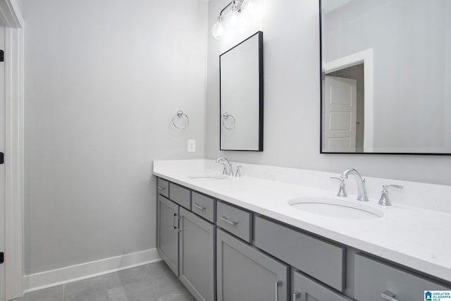 516 Preserve Pkwy, Hoover, AL 35226 - full bathroom featuring baseboards, double vanity, and a sink