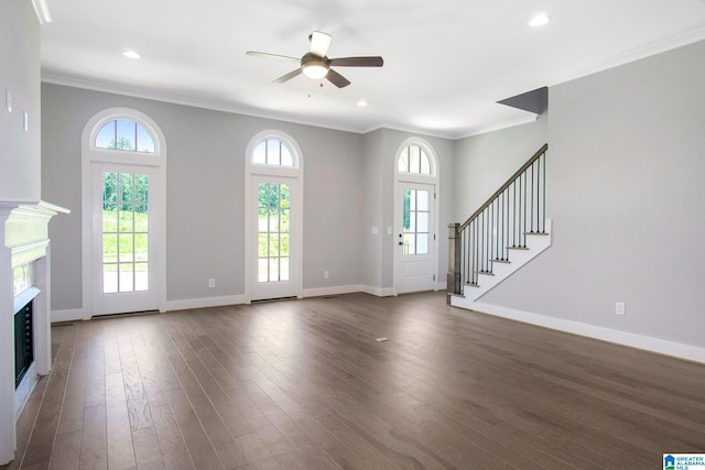 516 Preserve Pkwy, Hoover, AL 35226 - foyer featuring a ceiling fan, plenty of natural light, dark wood-style floors, and a fireplace