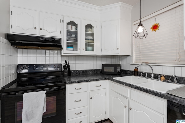 kitchen featuring a sink, white cabinets, under cabinet range hood, dark countertops, and black appliances