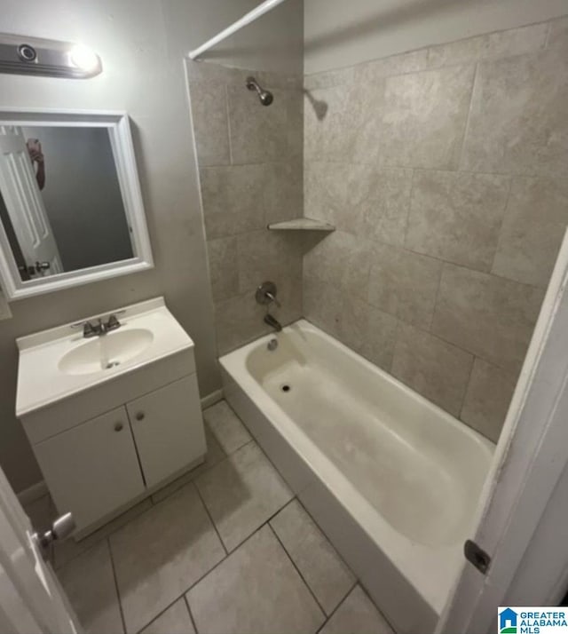 full bath with shower / bathtub combination, tile patterned floors, and vanity