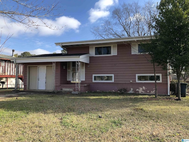 925 Ann St, Birmingham, AL 35228 - split level home featuring a front yard