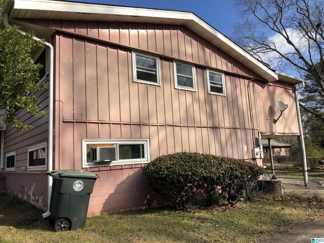 925 Ann St, Birmingham, AL 35228 - view of side of property with board and batten siding