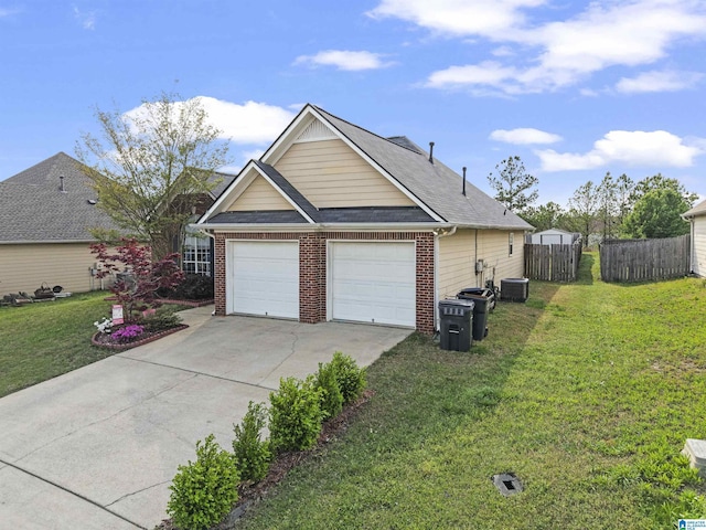 view of front of house with driveway, central air condition unit, fence, and a front lawn
