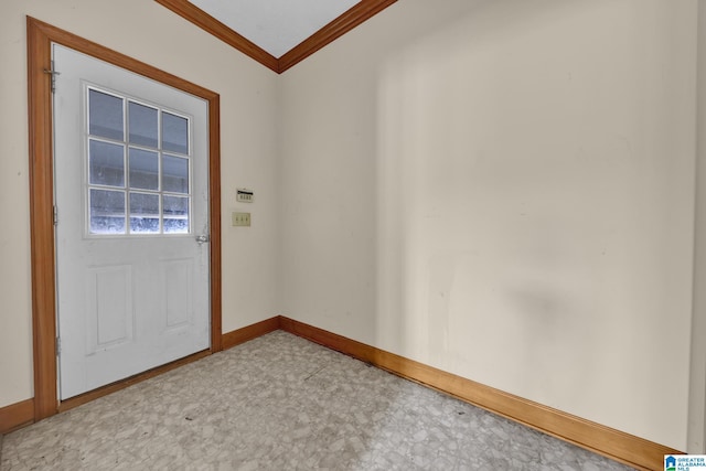 doorway to outside with crown molding, baseboards, and light floors
