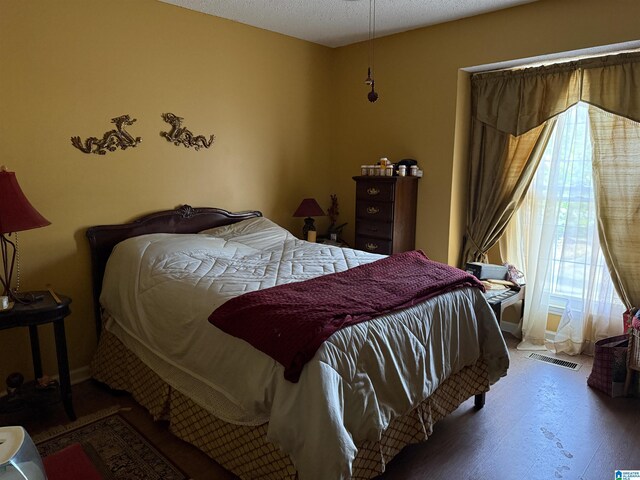1520 Tropical Cir, Alabaster, AL 35007 - bedroom with baseboards, multiple windows, and visible vents