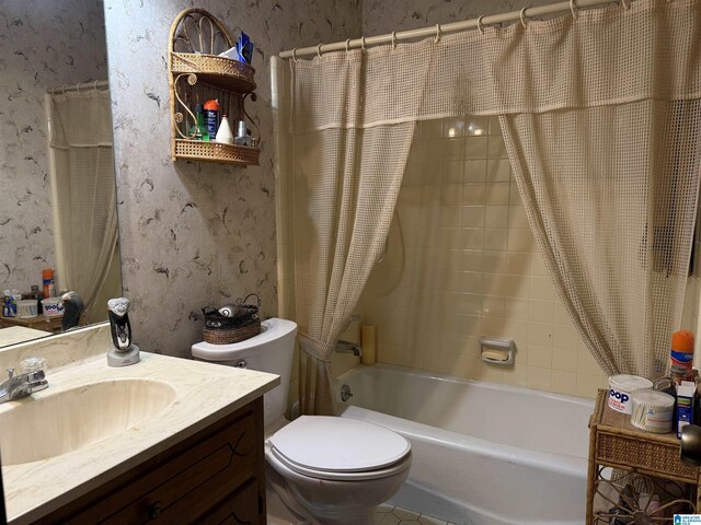 1520 Tropical Cir, Alabaster, AL 35007 - bathroom with wallpapered walls, shower / bath combo, toilet, and vanity