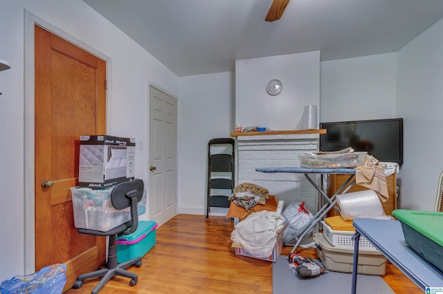 home office with wood finished floors