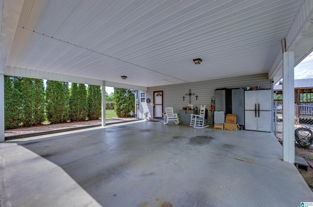 view of patio featuring a carport