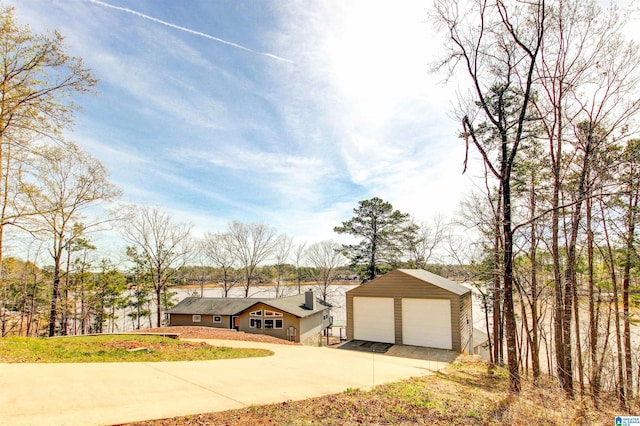 397 County Road 247, Wedowee, AL 36278 - view of front facade featuring an outdoor structure and a garage