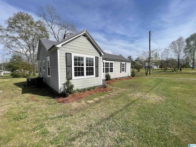 view of property exterior featuring a yard