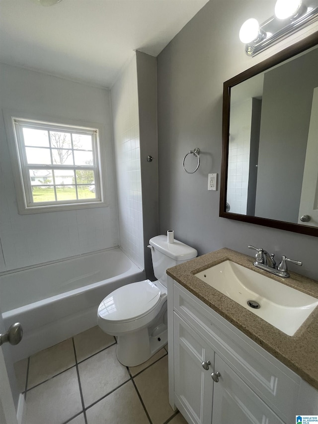 bathroom with tile patterned floors, toilet, vanity, a bathtub, and walk in shower