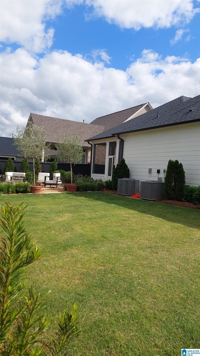 1308 Severn Way, Hoover, AL 35244 - back of property featuring a yard, outdoor lounge area, and central air condition unit