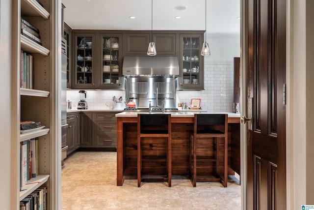 4603 Clairmont Ave, Birmingham, AL 35222 - bar with decorative backsplash, decorative light fixtures, recessed lighting, and stainless steel gas stovetop