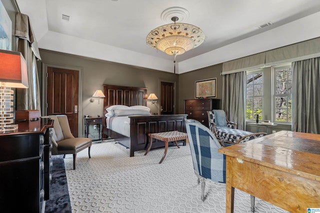 4603 Clairmont Ave, Birmingham, AL 35222 - carpeted bedroom with visible vents and a raised ceiling