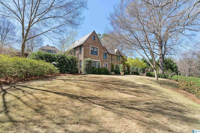 4603 Clairmont Ave, Birmingham, AL 35222 - view of side of home featuring brick siding and a yard