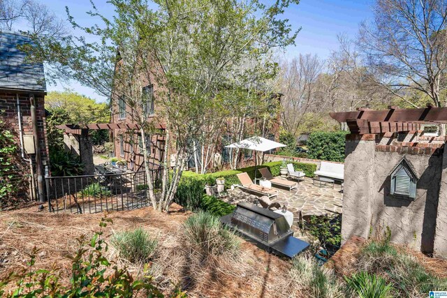 4603 Clairmont Ave, Birmingham, AL 35222 - view of yard featuring fence, a pergola, and a patio area