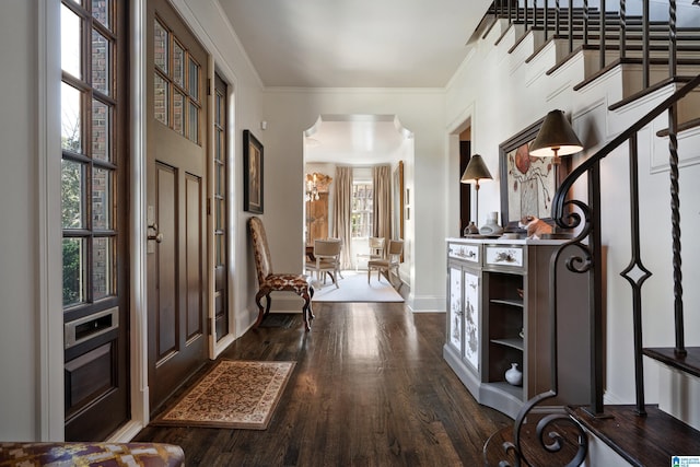 4603 Clairmont Ave, Birmingham, AL 35222 - foyer entrance featuring dark wood-type flooring, baseboards, and crown molding