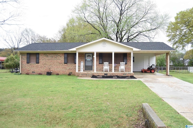 view of front of house featuring concrete driveway, crawl space, a front yard, brick siding, and a carport