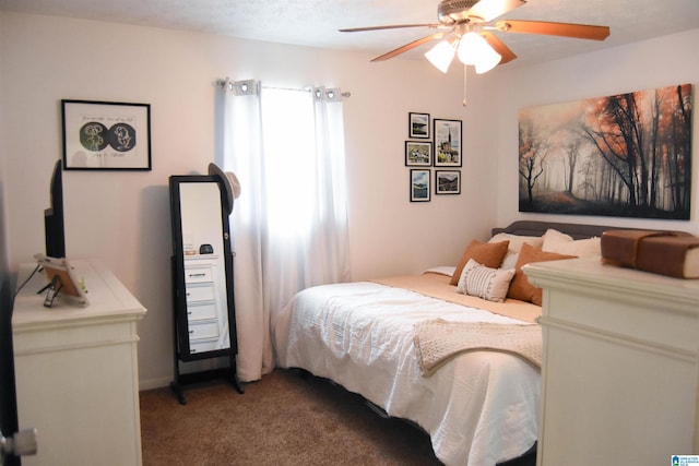 bedroom with light colored carpet and ceiling fan