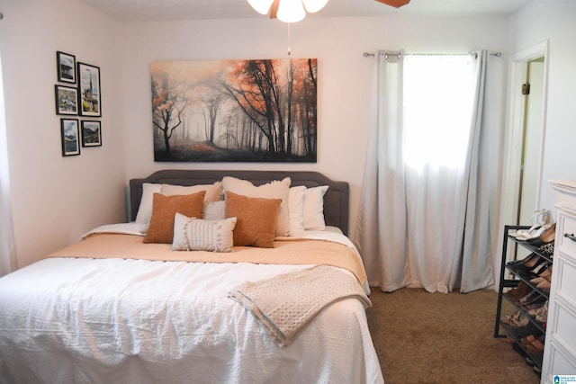 bedroom featuring carpet floors and ceiling fan