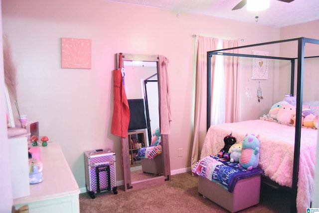 bedroom with baseboards, ceiling fan, and carpet