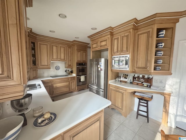 kitchen with light countertops, backsplash, a peninsula, light tile patterned floors, and stainless steel appliances