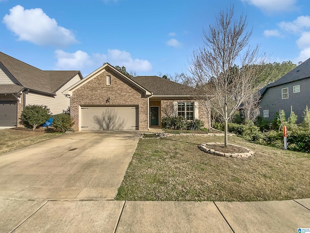 571 Grayson Pl, Chelsea, AL 35043 - single story home featuring a front lawn, a garage, brick siding, and concrete driveway