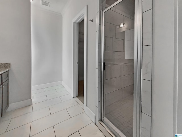 571 Grayson Pl, Chelsea, AL 35043 - full bathroom featuring visible vents, crown molding, tile patterned floors, vanity, and a stall shower