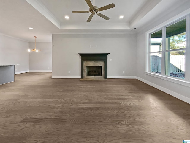 571 Grayson Pl, Chelsea, AL 35043 - unfurnished living room with dark wood finished floors, baseboards, a fireplace, and a raised ceiling