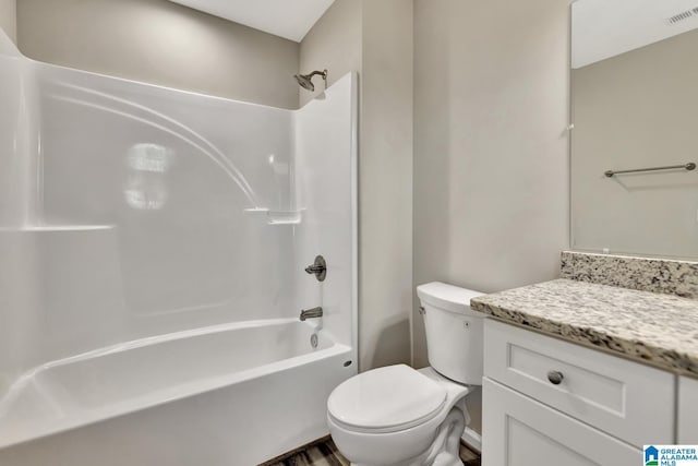 full bath with visible vents,  shower combination, toilet, and vanity