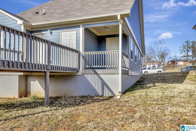 view of property exterior with covered porch