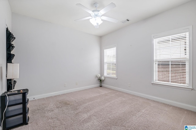 471 River Oaks Ln, Helena, AL 35080 - empty room with baseboards, a ceiling fan, and light carpet