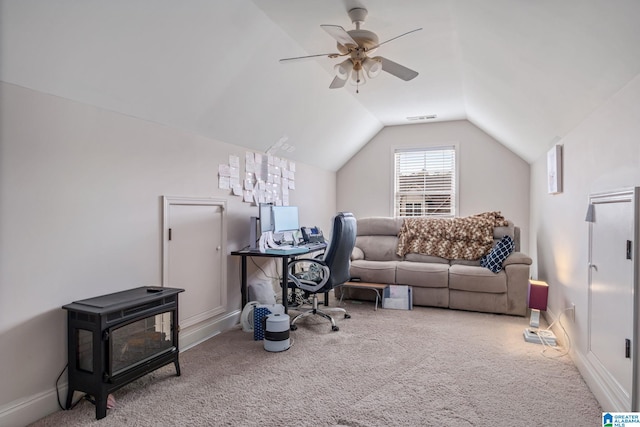 471 River Oaks Ln, Helena, AL 35080 - office area with carpet floors, a ceiling fan, vaulted ceiling, a wood stove, and baseboards