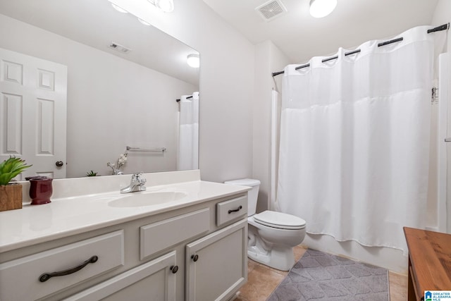 471 River Oaks Ln, Helena, AL 35080 - bathroom with vanity, toilet, tile patterned floors, and shower / tub combo with curtain