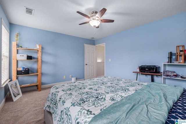471 River Oaks Ln, Helena, AL 35080 - bedroom with carpet, baseboards, and ceiling fan