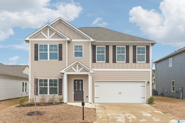 craftsman house with driveway, an attached garage, central AC, and board and batten siding