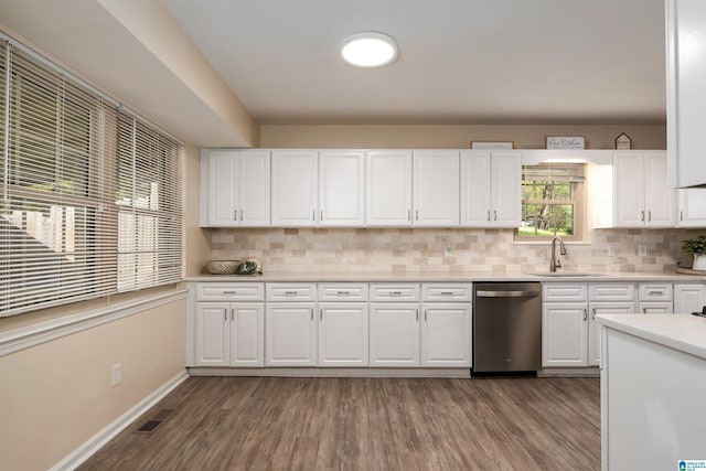 1324 W Navajo Dr, Alabaster, AL 35007 - kitchen with dark wood finished floors, visible vents, dishwasher, a sink, and decorative backsplash