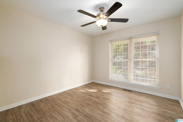 1324 W Navajo Dr, Alabaster, AL 35007 - unfurnished room featuring light wood-style floors, baseboards, a ceiling fan, and visible vents