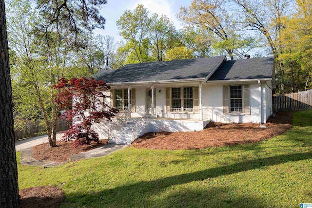 1324 W Navajo Dr, Alabaster, AL 35007 - ranch-style home featuring a front yard, stucco siding, fence, and covered porch