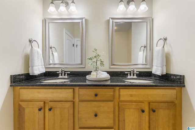 full bath with double vanity and a sink