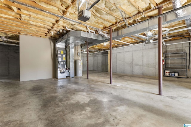 unfinished basement with heating unit and water heater