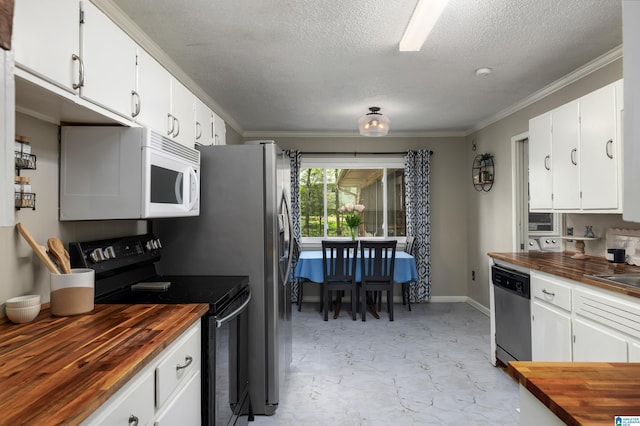 470 16th St, Calera, AL 35040 - kitchen featuring crown molding, wooden counters, stainless steel dishwasher, black electric range, and white microwave