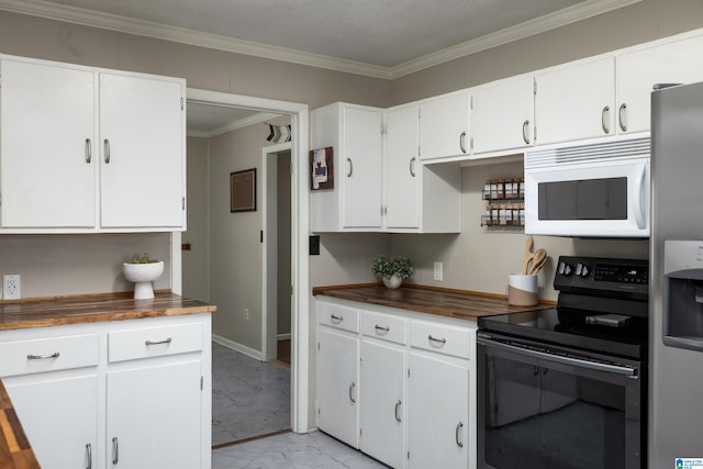 470 16th St, Calera, AL 35040 - kitchen with stainless steel fridge, marble finish floor, wooden counters, black electric range, and white microwave