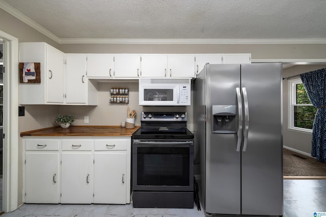 470 16th St, Calera, AL 35040 - kitchen featuring ornamental molding, stainless steel refrigerator with ice dispenser, black electric range, and white microwave