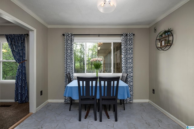 470 16th St, Calera, AL 35040 - dining space with marble finish floor, baseboards, crown molding, and a textured ceiling