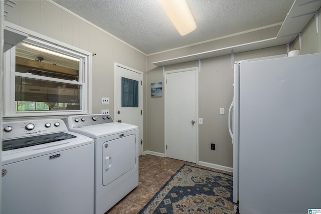 470 16th St, Calera, AL 35040 - clothes washing area featuring washing machine and dryer, crown molding, laundry area, and a textured ceiling