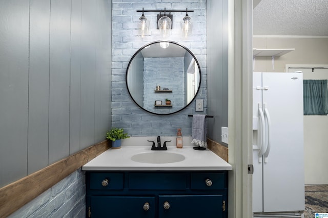 470 16th St, Calera, AL 35040 - bathroom featuring vanity and a textured ceiling