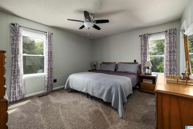470 16th St, Calera, AL 35040 - bedroom featuring carpet flooring, baseboards, ceiling fan, and a textured ceiling